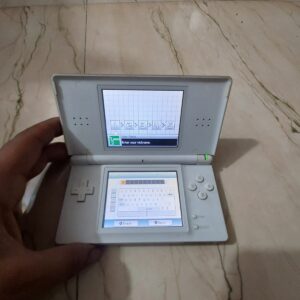 Nintendo DS lite white edition with stylus and 1 Nintendo ds cartridge