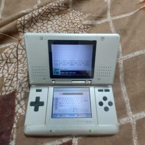Nintendo DS with 1 gameboy cartridge