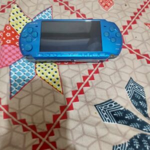 Psp 3004 like new blue with original charger